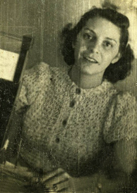 Gladys Nemmer Bertrand (now 95) at the cash register of the BK Coffee Shop.